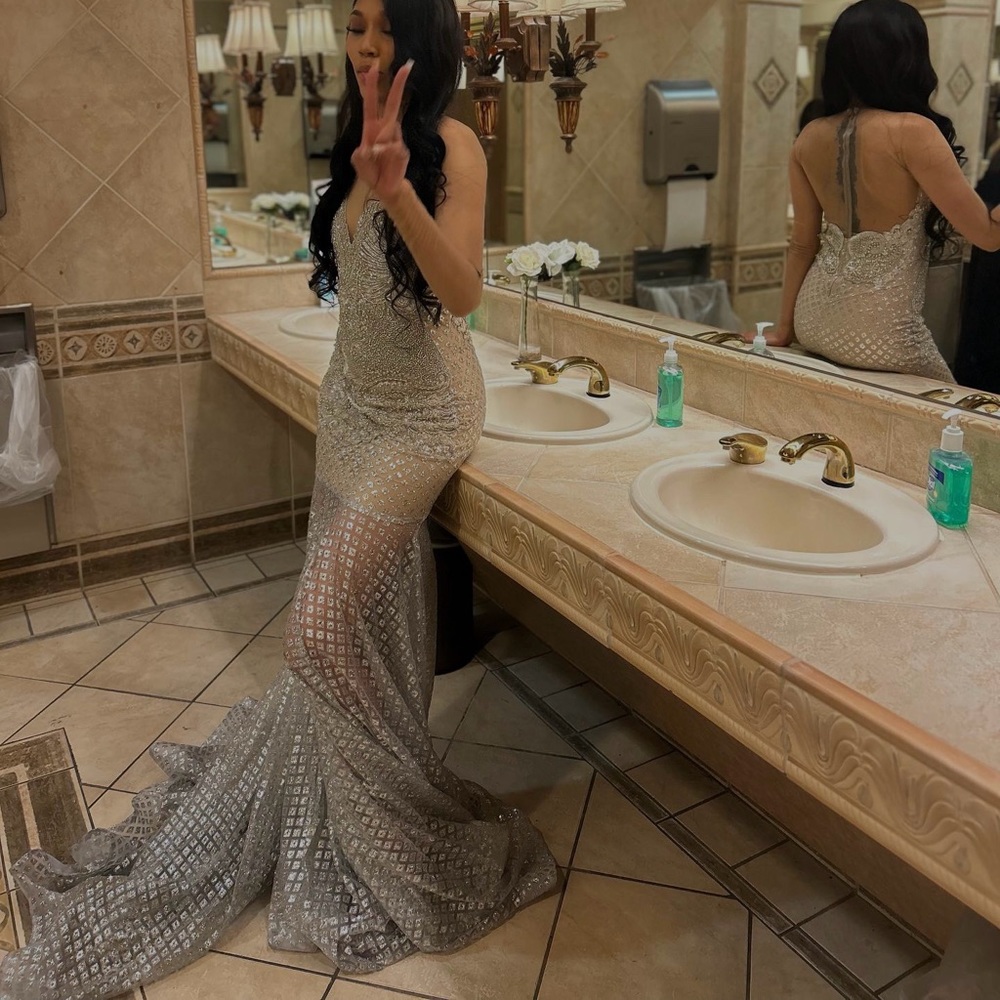 This pieces was Custom Made.Down to every Stone,Crystal,ancustom flesh tone lace
